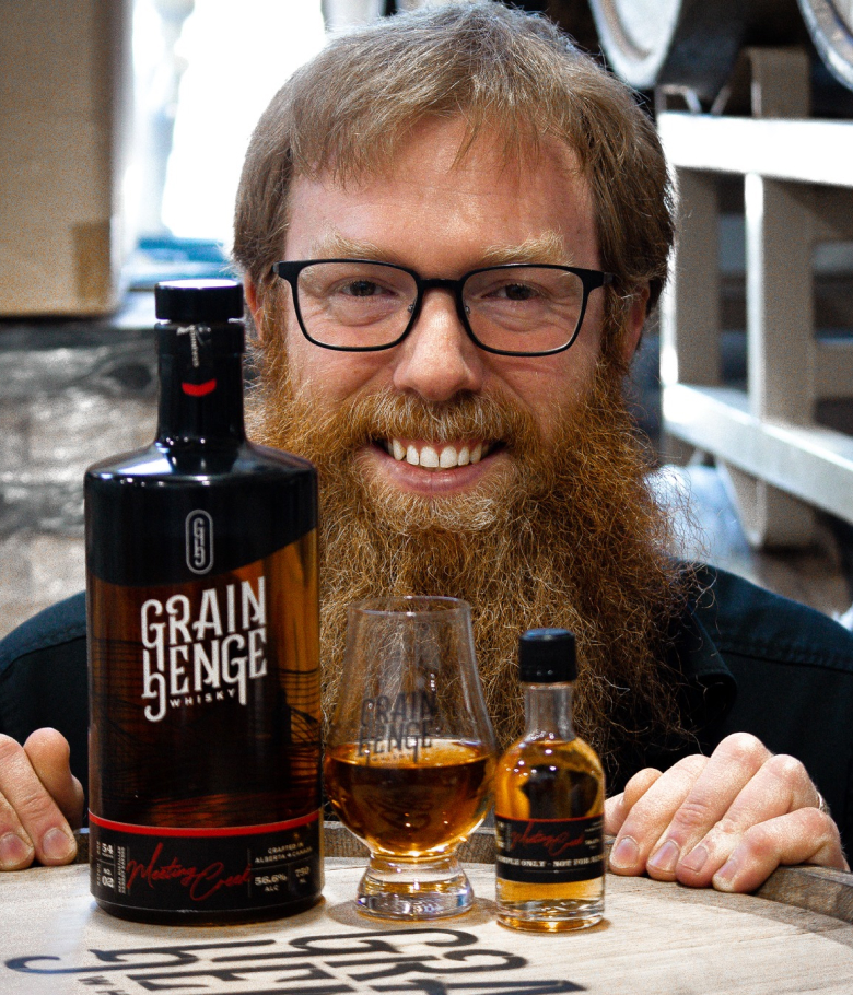 A man with grain henge bottle